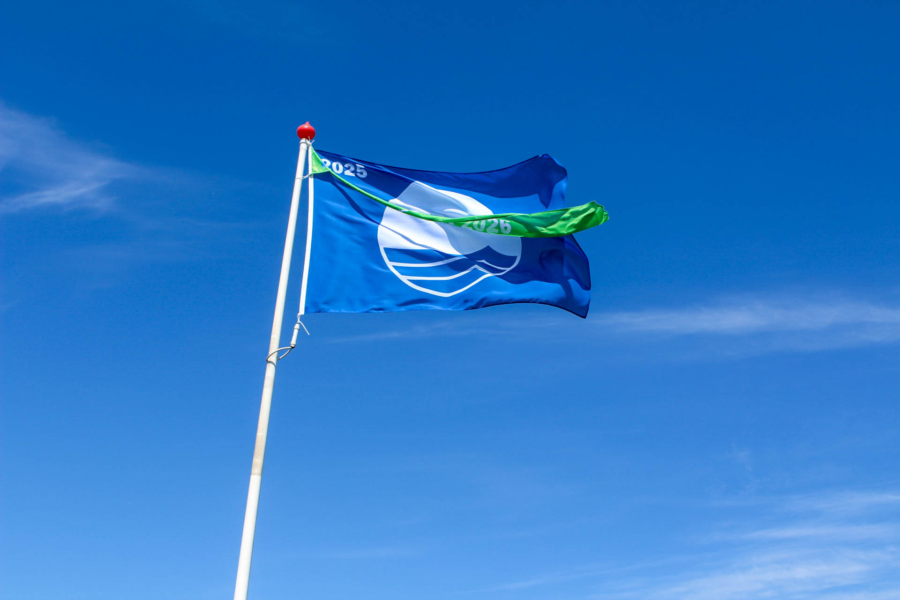Blauwe vlag en groene wimpel keurmerk gecertificeerd