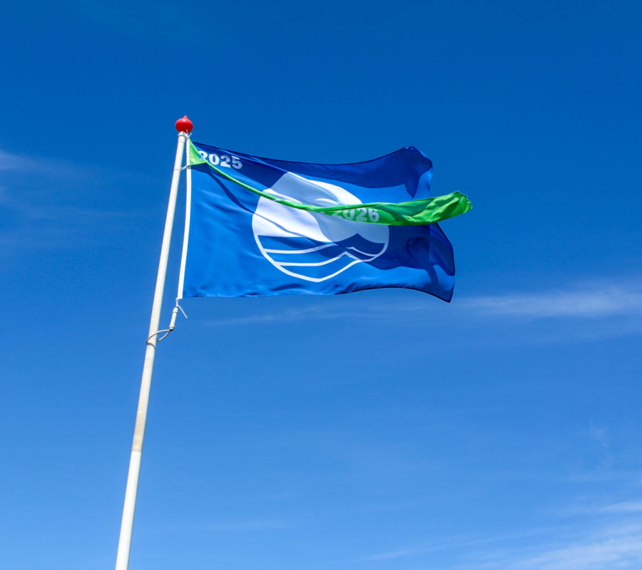 Blauwe vlag en groene wimpel keurmerk gecertificeerd